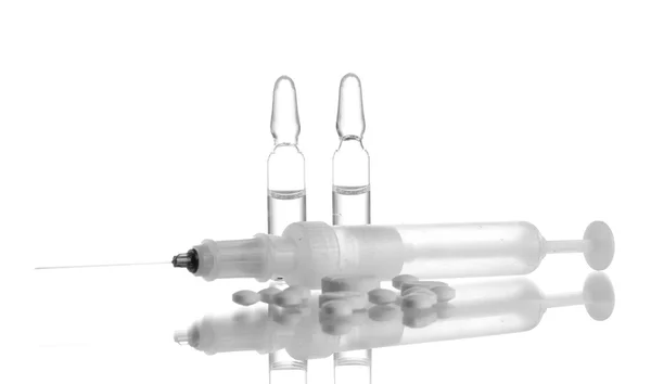 Syringe monovet, ampoules and pills isolated on white — Stock Photo, Image