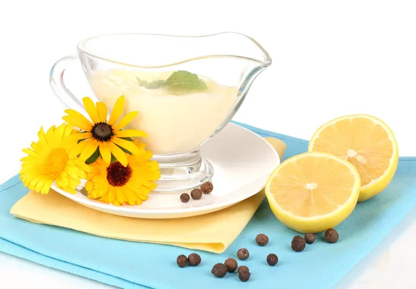 Mayonnaise in bowl on napkin isolated on white — Stock Photo, Image
