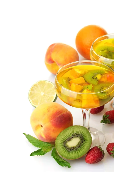 Punch in glasses with fruits, isolated on white — Stock Photo, Image