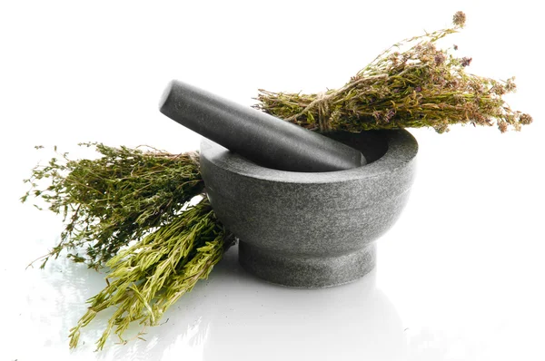 Dried herbs in mortar, isolatrd on white — Stock Photo, Image