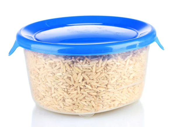 Коричневий рис в банці на білому фоні — стокове фото