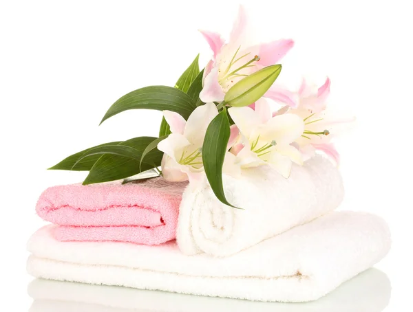 Beautiful lily on towel isolated on white — Stock Photo, Image