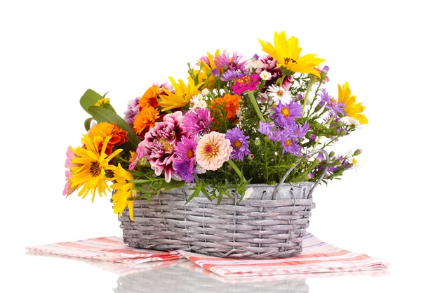 Beautiful bouquet of bright flowers in basket isolated on white Royalty Free Stock Photos