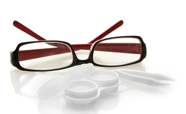 Glasses, contact lenses in containers and tweezers, isolated on white Stock Photo