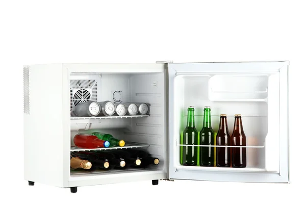 Mini fridge full of bottles of alcoholic beverages isolated on white — Stock Photo, Image