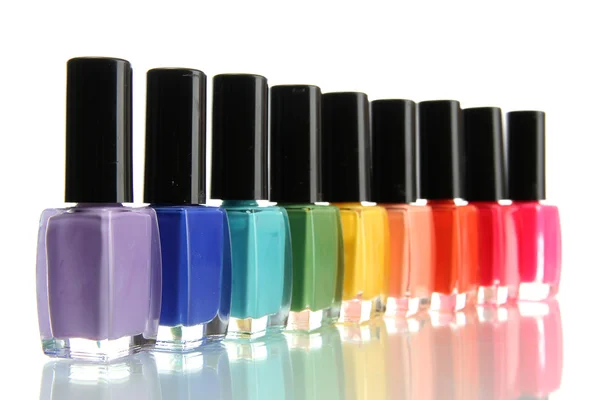 Grupo de esmaltes de uñas brillantes aislados en blanco — Foto de Stock