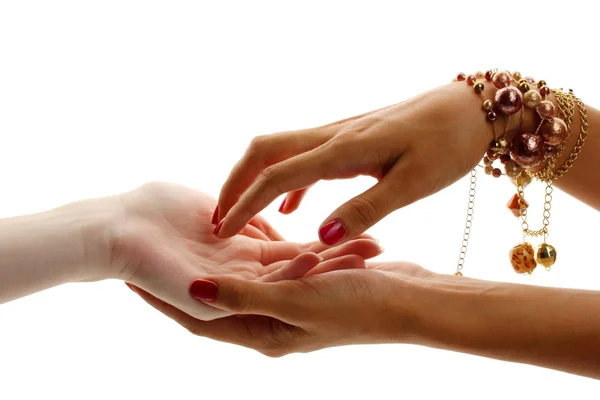 Reading the lines hand in a woman's hands isolated on white — Stock Photo, Image