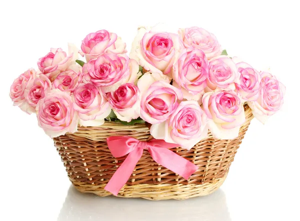 Beautiful bouquet of pink roses in basket, isolated on white — Stock Photo, Image