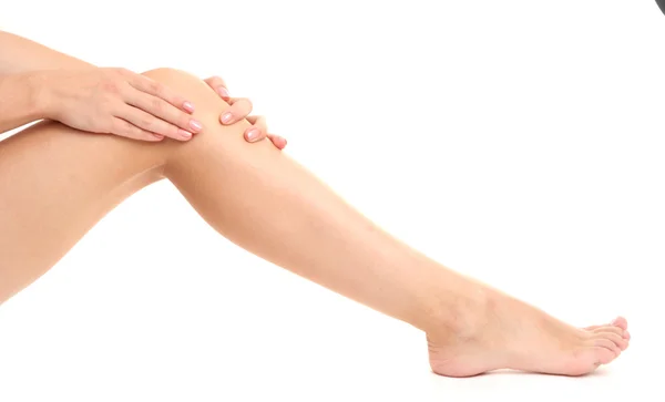 Donna con gamba dolorante, isolata su bianco — Foto Stock