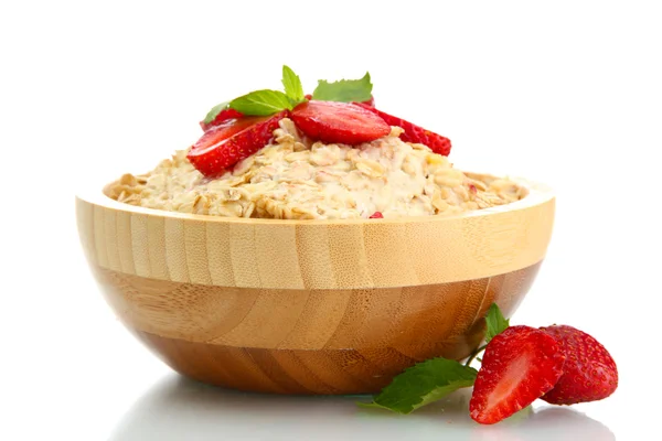 Tasty oatmeal with strawberries, isolated on white — Stock Photo, Image