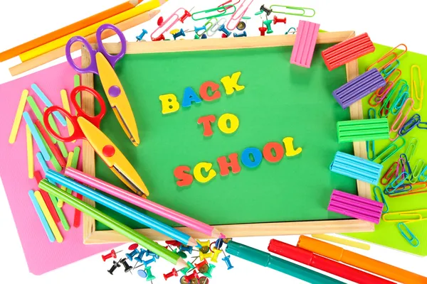 Small chalkboard with school supplies on white background. Back to School — Stock Photo, Image