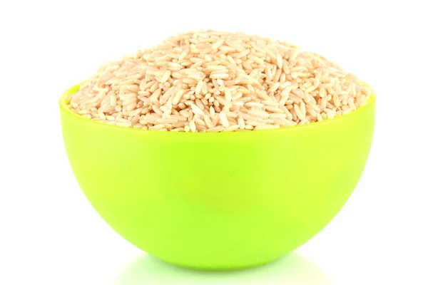 Brown rice in a green plate , isolated on white — Stock Photo, Image