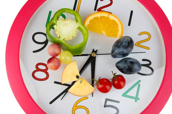 Alimentos dietéticos no tempo isolado em branco — Fotografia de Stock