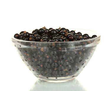 Fresh black currant in transparent bowl isolated on white