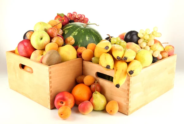 Still life of fruit in a boxes isolated on white — Stock Photo, Image