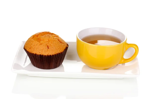 Fresh muffin with tea isolated on white — Stockfoto