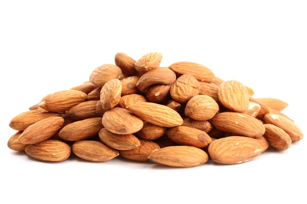 Smakelijke amandelen noten, geïsoleerde op wit — Stockfoto