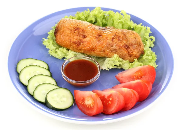 Tasty meat cutlet with garnish on plate isolated on white — Stock Photo, Image