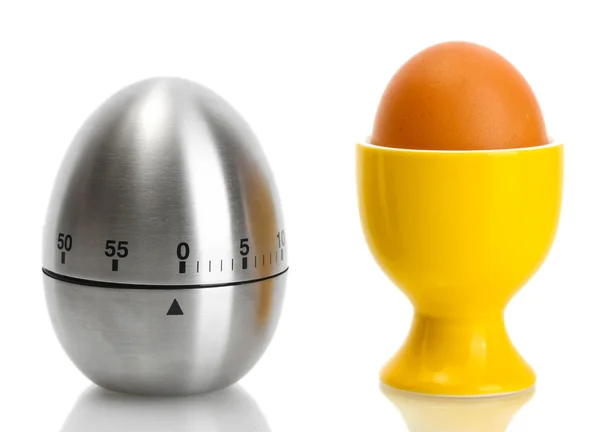 Таймер яйця і яйце в помаранчевій підставці ізольовані на білому — стокове фото