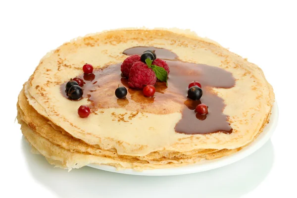 Delicious pancakes with berries and chocolate on plate isolated on white — Stock Photo, Image