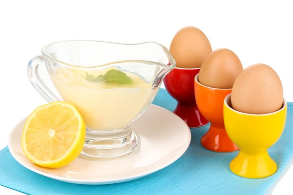 Mayonnaise in bowl on napkin isolated on white — Stock Photo, Image