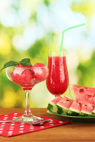 Refreshing desserts of watermelon on green background close-up — Stock Photo, Image