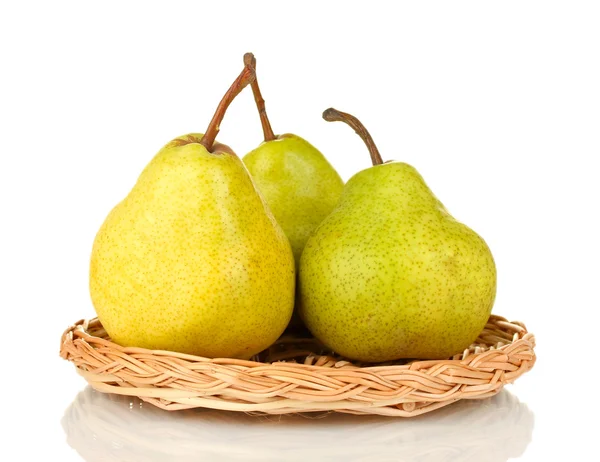 Ripe pears on a wicker mat isolated on white Stock Image