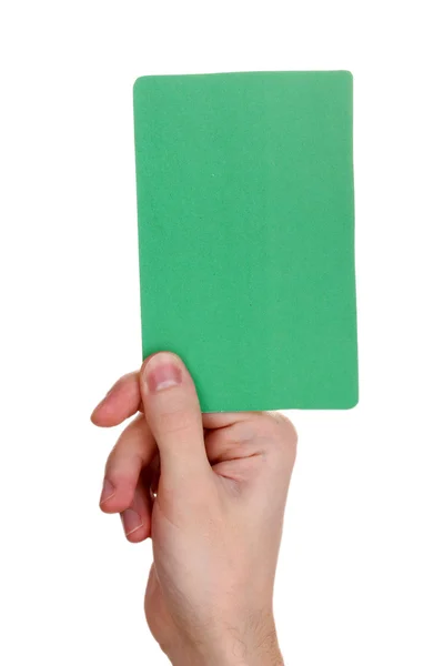 Χέρι που κρατά την πράσινη κάρτα που απομονώνονται σε λευκό — Φωτογραφία Αρχείου