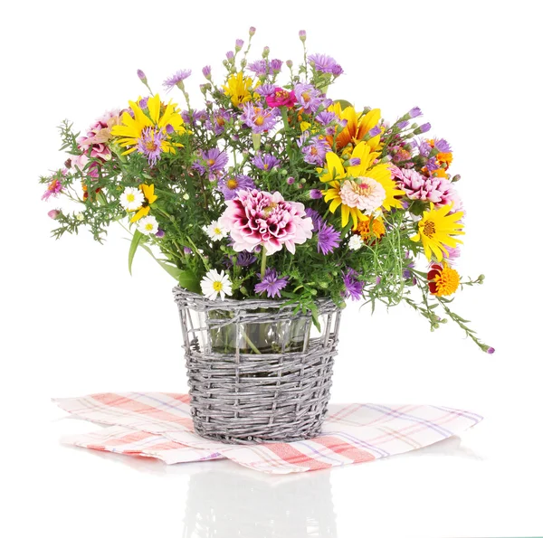 Beautiful bouquet of bright flowers in basket isolated on white — Stock Photo, Image