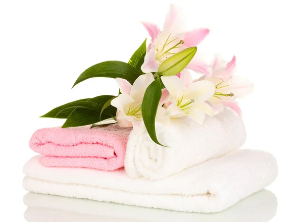 Beautiful lily on towel isolated on white — Stock Photo, Image