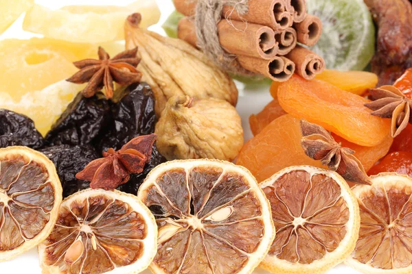 Dried fruits with cinnamon and star anise close-up — Stock Photo, Image