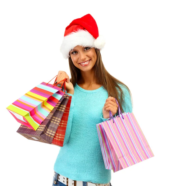 Hermosa joven con bolsas de compras, aislada en blanco — Foto de Stock