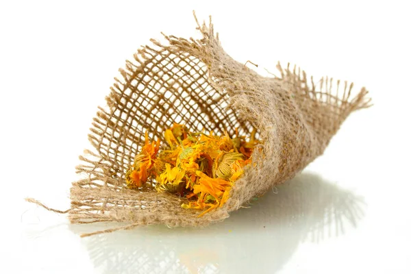 Dried calendula flowers in sacking, isolated on white — Stock Photo, Image