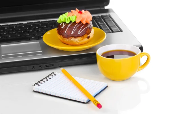 Eating at work place near laptop — Stock Photo, Image