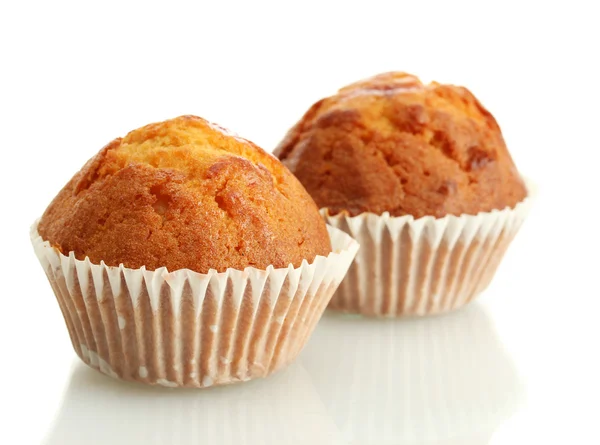 Beyaz izole lezzetli muffin kekler — Stok fotoğraf