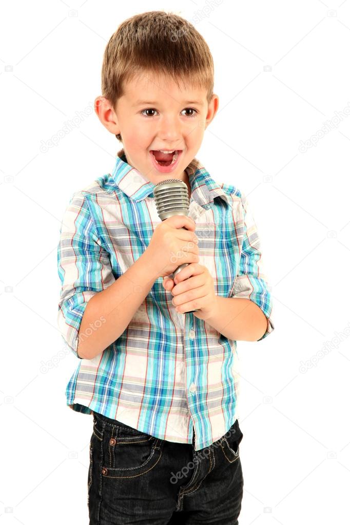funny little boy with microphone, isolated on white