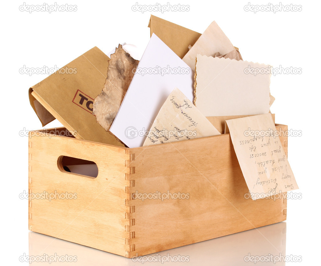 Wooden crate with papers and letters isolated on white