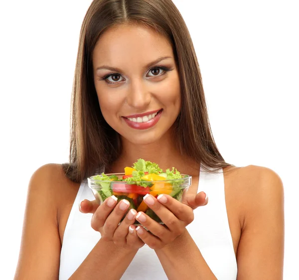 Bela jovem com salada, isolada em branco — Fotografia de Stock