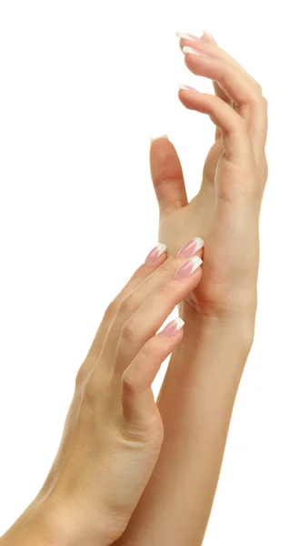 Όμορφη γυναίκα χέρια με γαλλικό μανικιούρ, απομονωμένα σε λευκό — Φωτογραφία Αρχείου