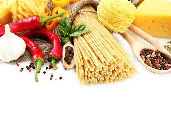 Pasta spaghetti, vegetables and spices, isolated on white