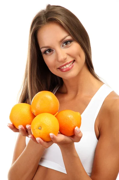 Belle jeune femme aux oranges, isolée sur blanc — Photo