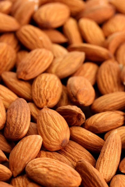 Tasty almond nuts, close up — Stock Photo, Image