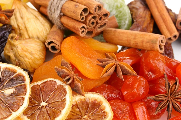Dried fruits with cinnamon and star anise close-up — Stock Photo, Image