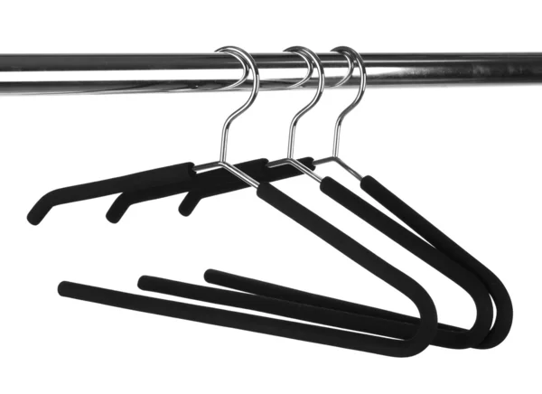 Black clothes hangers on white background close-up — Stock Photo, Image