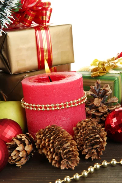 Composition from Christmas decorations close-up on wooden table on white ba — Stock Photo, Image