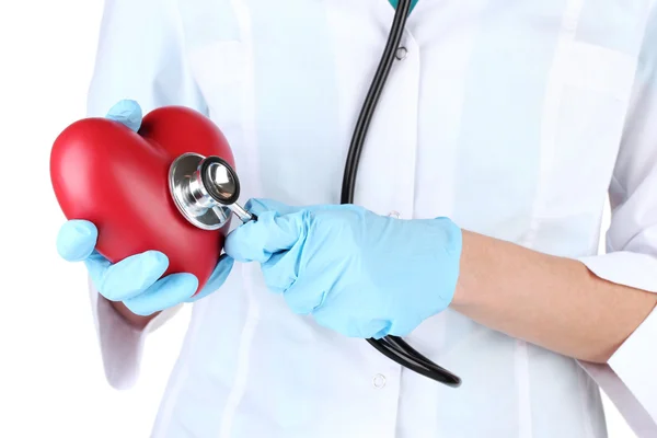 Доктор со стетоскопом в руке. изолированные на белом — стоковое фото