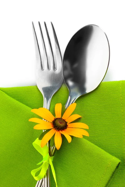 Spoon, fork and flower on napkin, isolated on white — Stock Photo, Image