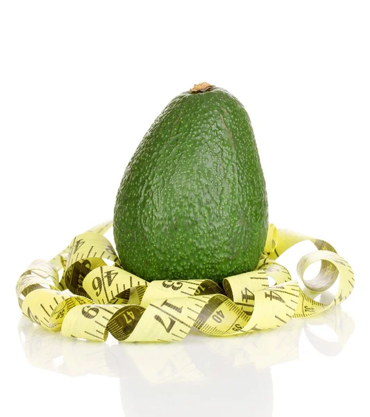 Avocado with measuring tape isolated on white — Stock Photo, Image