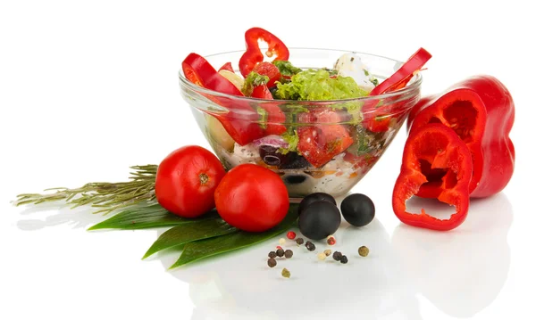 Fresh greek salad in glass bowl isolated on white — Stockfoto