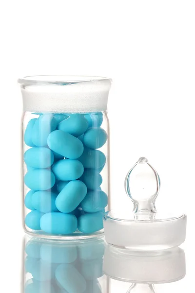 Flacon transparent avec pilules isolées sur blanc — Photo